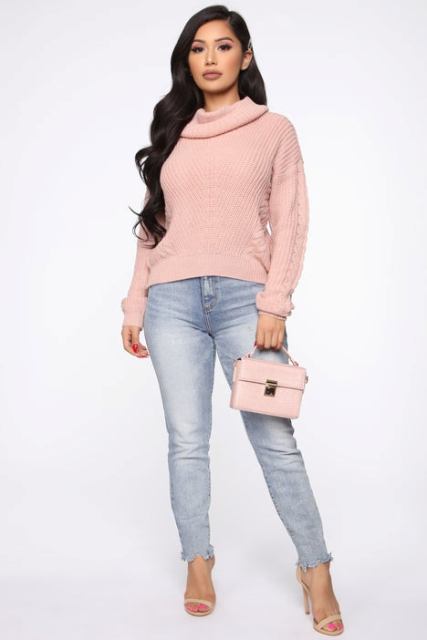 With light blue jeans, pale pink leather bag and beige high heels