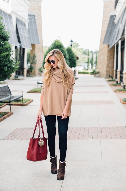 With navy blue leggings, marsala leather tote bag, rounded sunglasses and dark brown leather mid calf boots