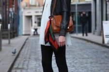With white pleated blouse, black leather jacket, brown leather bag, black leggings and colorful scarf