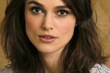 a lovely dark brown medium length lob and side-swept bangs is a natural and veyr pretty idea