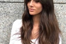 long wavy dark brunette hair with bottleneck and wispy bangs and a slight ombre effect is amazing