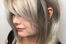 silver blonde medium length hair with straight side bangs and highlights is a beautiful idea to try