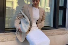 02 a beautiful neutral spring outfit with a pleated mxi dress, a tan oversized blazer, tan booties and a creamy woven tote