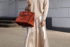 05 a neutral jumper, a neutral slip midi skirt, brown boots, a brown tote and a chain necklace for work
