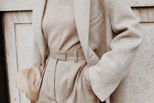 09 a neutral work look with a tan turtleneck, matching high-waisted pants, a creamy blazer and a tan bag