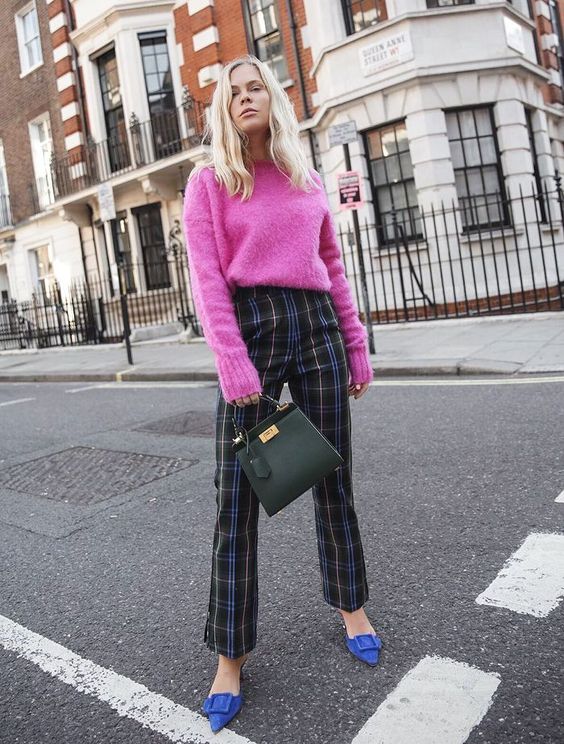 a pretty date look with a hot pink jumper, checked trousers, bold blue shoes and a dark green bag