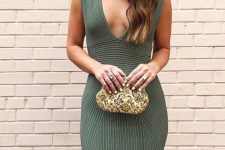 24 a sexy green knee dress with thick straps and a deep neckline, an embellished bag