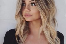 24 lovely wavy blonde hair with a dark root is a chic and stylish idea that looks more natural than usual blonde