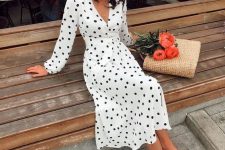 26 a white and black polka dot midi dress, red lace up shoes, a red headband and a straw bag