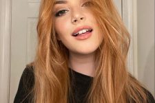 27 long ginger hair with a bit of texture can be also called strawberry blonde, and this is a very trendy color