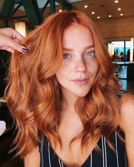beautiful bright ginger hair with waves is a fantastic idea to rock, make a statement with color