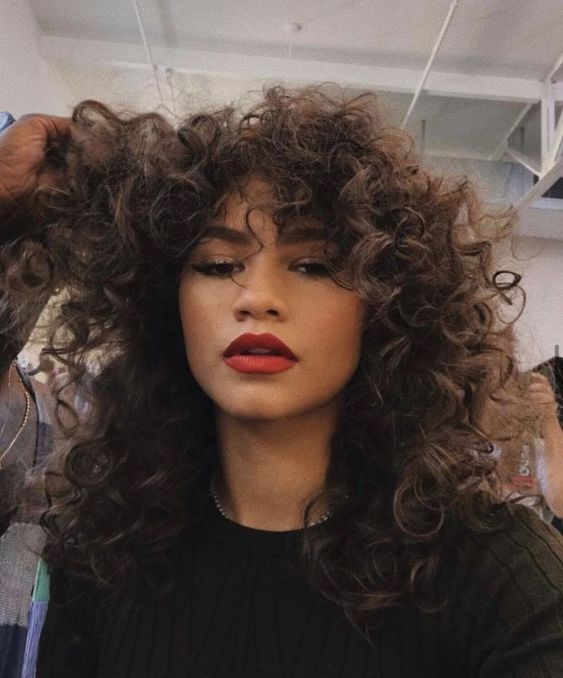 Zendaya rocking her gorgeous natural curls looks amazing and sets the tone for the trend