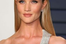 46 Rosie Huntington-Whiteley wearing her honey blonde hair sleek and straight looks absolutely fantastic and chic