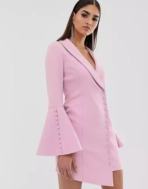 A pale pink bell sleeved button front asymmetrical blazer dress