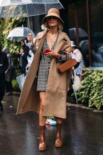 With black and white printed button front mini dress, beige midi coat, brown bag and brown patent leather mid calf platform boots