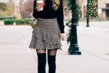 With black turtleneck sweater and black suede over the knee boots
