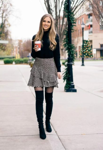 With black turtleneck sweater and black suede over the knee boots