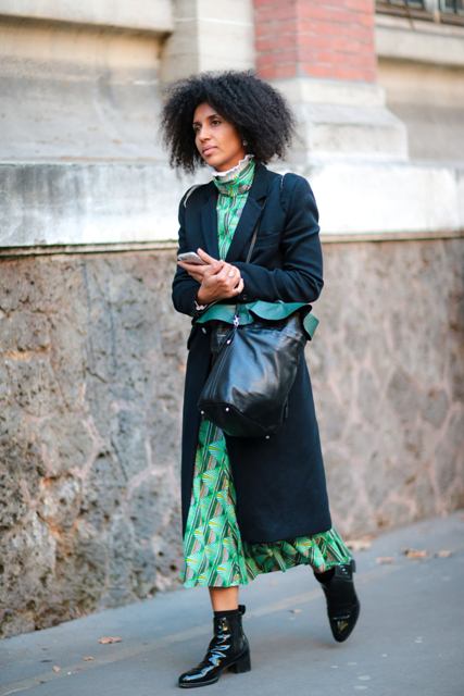With green printed midi dress, midi coat and black leather tote bag