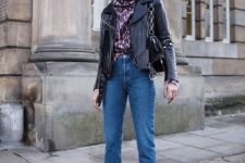 With leopard printed loose turtleneck sweater, black leather fringe jacket, black suede chain strap bag and cropped jeans
