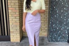 With light yellow fitted shirt and white low heel mules