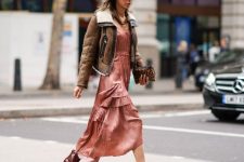 With pale pink ruffled pleated midi dress, jacket and leopard printed clutch