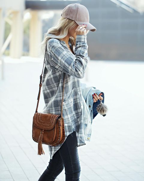 With plaid long shirt, brown tassel bag, jeans and denim jacket
