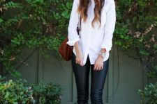 With white button down shirt, brown leather bag, black leather skinny pants and white flat shoes