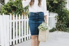 With white button down shirt, denim knee-length skirt, beige bag and light blue flat shoes