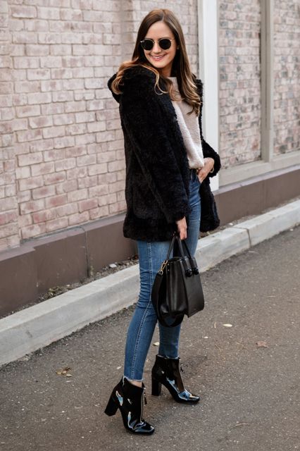 With white loose shirt, sunglasses, black faux fur jacket, black leather bag and skinny cropped jeans