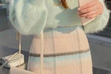 a pastel look with a light green fluffy jumper, a checked pastel mini skirt, a creamy crossbody bag