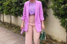 10 a spring work outfit with a Very Peri t-shirt and mules, a pink blazer, peachy pants and a green bag plus layered necklaces
