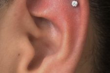 11 glam and chic ear styling with a stud in the love, a triple helix piercing with matching studs that differ in size