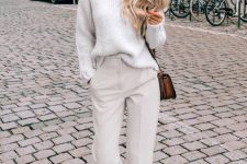 15 a white sweater, cremay cropped pants, white trainers, a brown crossbody bag for a lovely winter to spring look