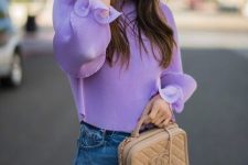 28 a chic and girlish look with a Very Peri top with ruffle sleeves, blue jeans, a tan box bag for every day