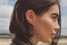 32 elegant ear styling with a double lobe, a conch and a double flat piercing, with rhinestone hoops and studs is a chic idea