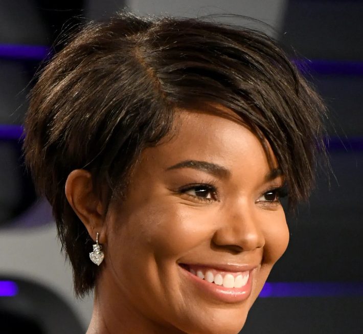 Gabrielle Union wearing an intensely layered pixie cut, further proof that shaggy styles don't require a ton of length
