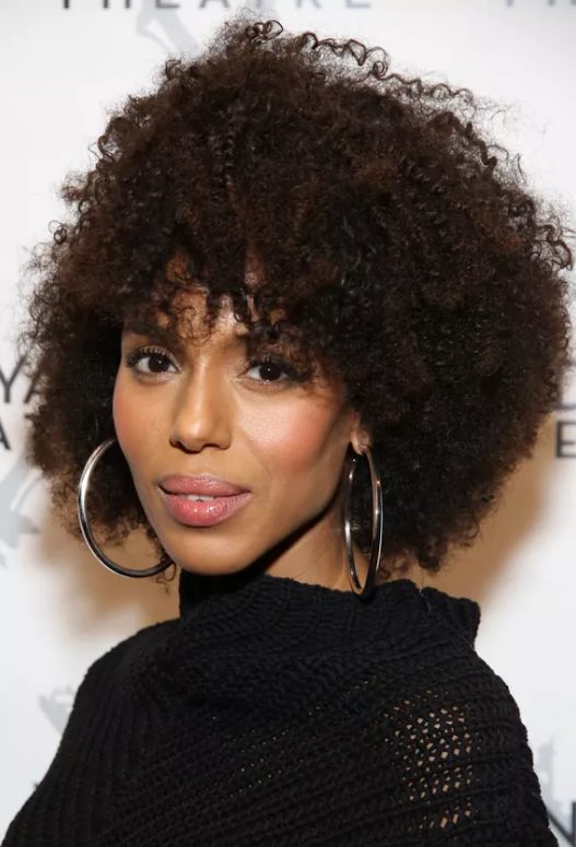 Kerry Washington's micro-curls look so good with bangs, this is a wild and natural hairstyle to rock