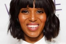 Kerry Washington’s straight bangs juxtaposed with a wavy lob perfectly frames her oval face and (killer) bone structure