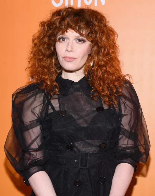 Natasha Lyonne is pretty much always sporting signature big curls and wavy fringe, with a defined curl pattern that isn't too heavy for the face