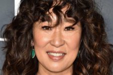 Sandra Oh’s curly shag cut framing the face creates a great soft movement from the length of her bangs to the length of the hair