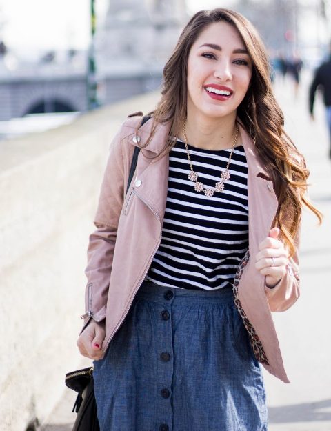 With black and white striped shirt, denim button front skirt, necklace and black bag