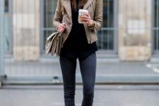 With black turtleneck, gray wide brim hat, beige bag, skinny jeans and beige ankle boots