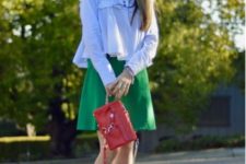 With green mini skirt, red leather bag and golden high heel shoes