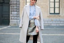 With light gray midi coat, silver mini skirt, black tights and black leather high boots