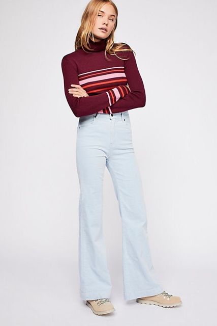 With marsala, pale pink and red striped turtleneck sweater and beige flat lace up shoes