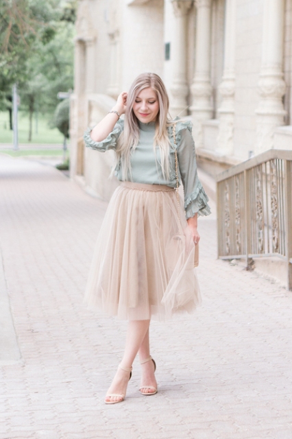 With pale pink midi skirt and beige ankle strap shoes