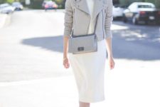 With white knee-length dress, sunglasses, silver pumps and gray leather chain strap bag