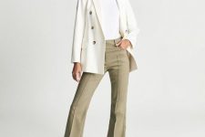With white t-shrit, white blazer and heeled shoes