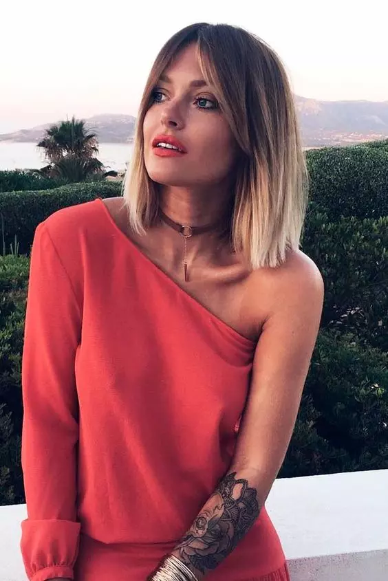 a bold ombre brown to icy blonde shoulder-length bob with long curtain bangs is an amazing idea to rock