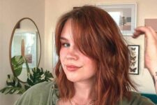a gorgeous ginger long bob with curtain bangs and messy waves is a stunning idea to look bold and catchy